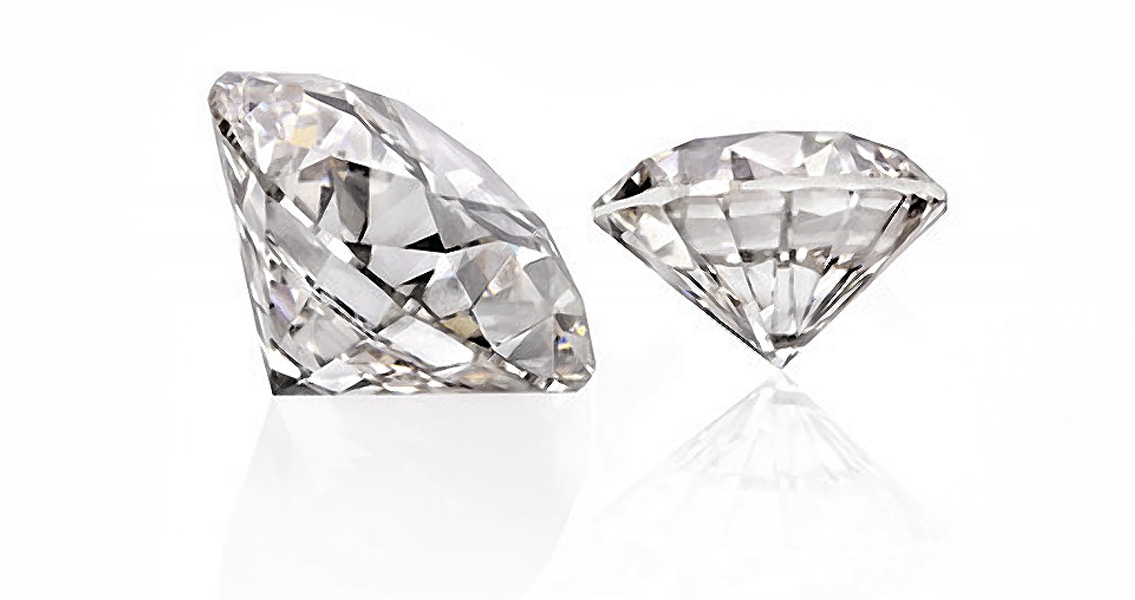 Two Diamonds Grown by Washington Diamonds1