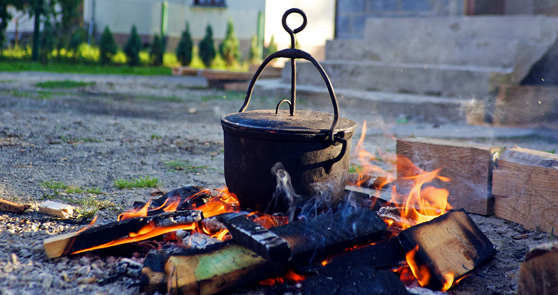 Pot cooking on open fire