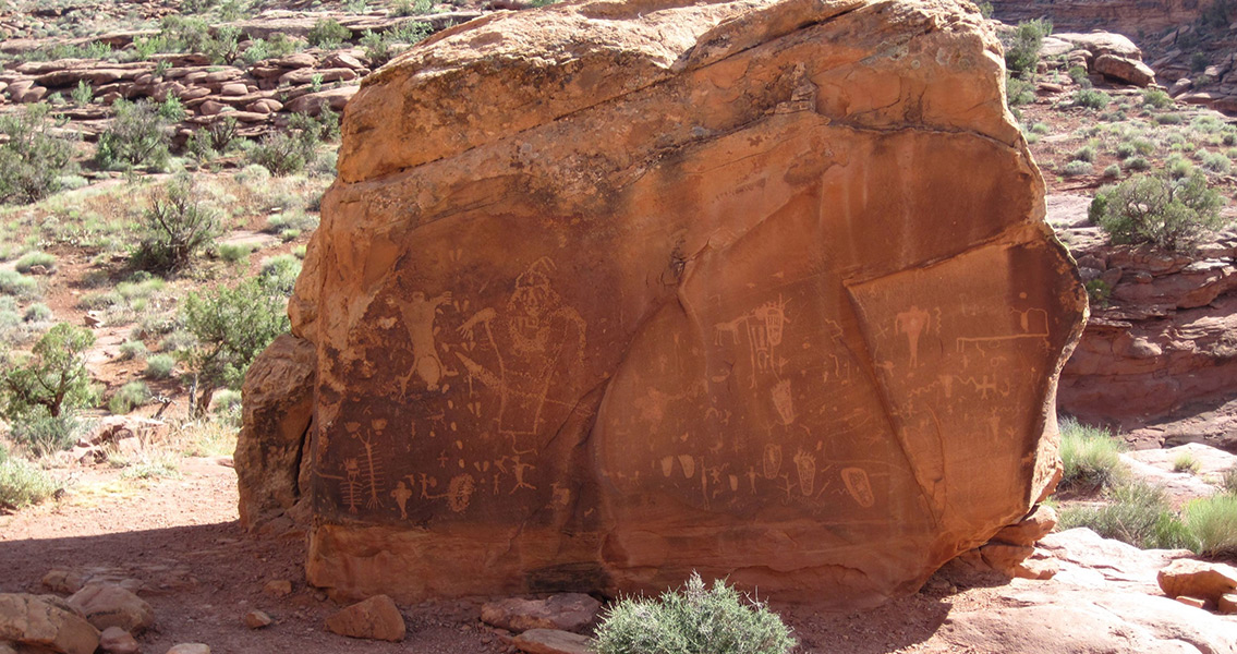 Indian petroglyphs on Navajo Sandstone talus block